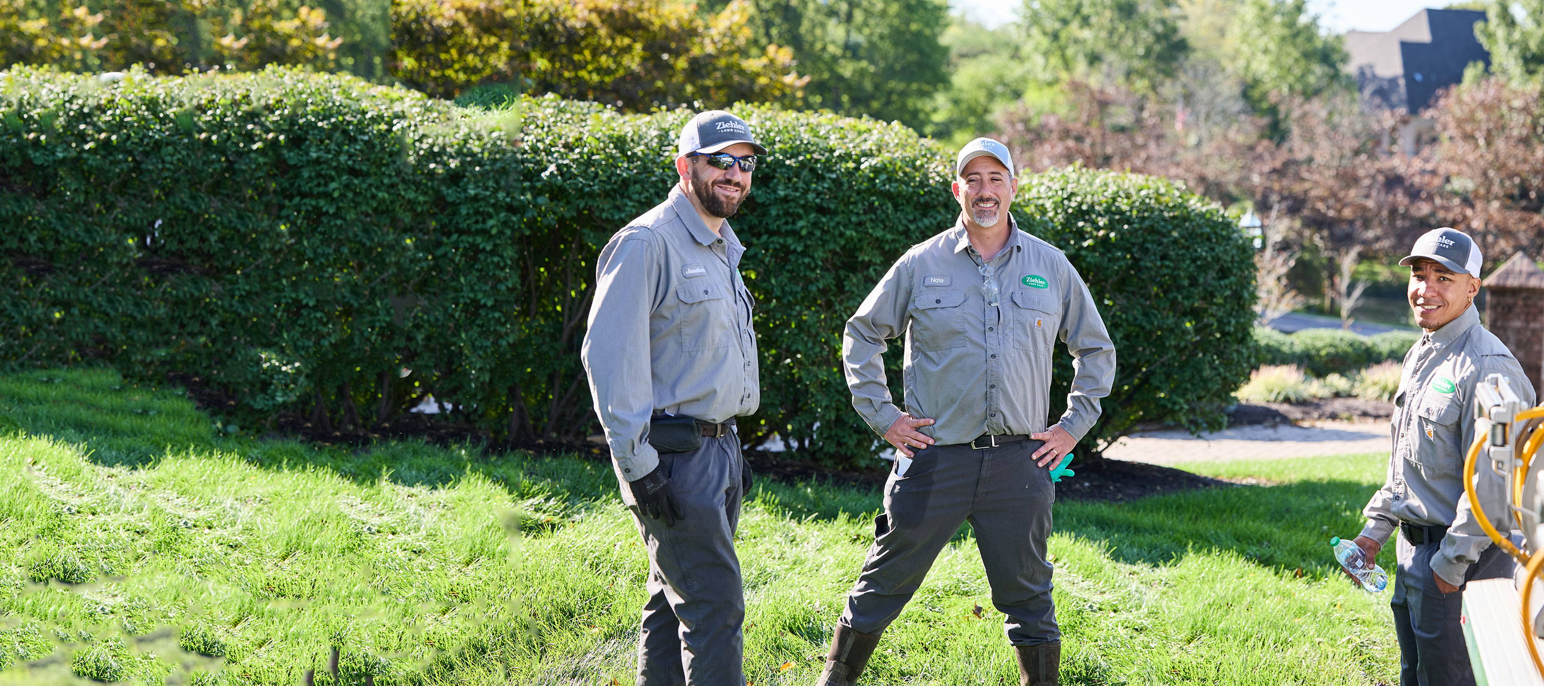 Ziehler employees smiling on lawn